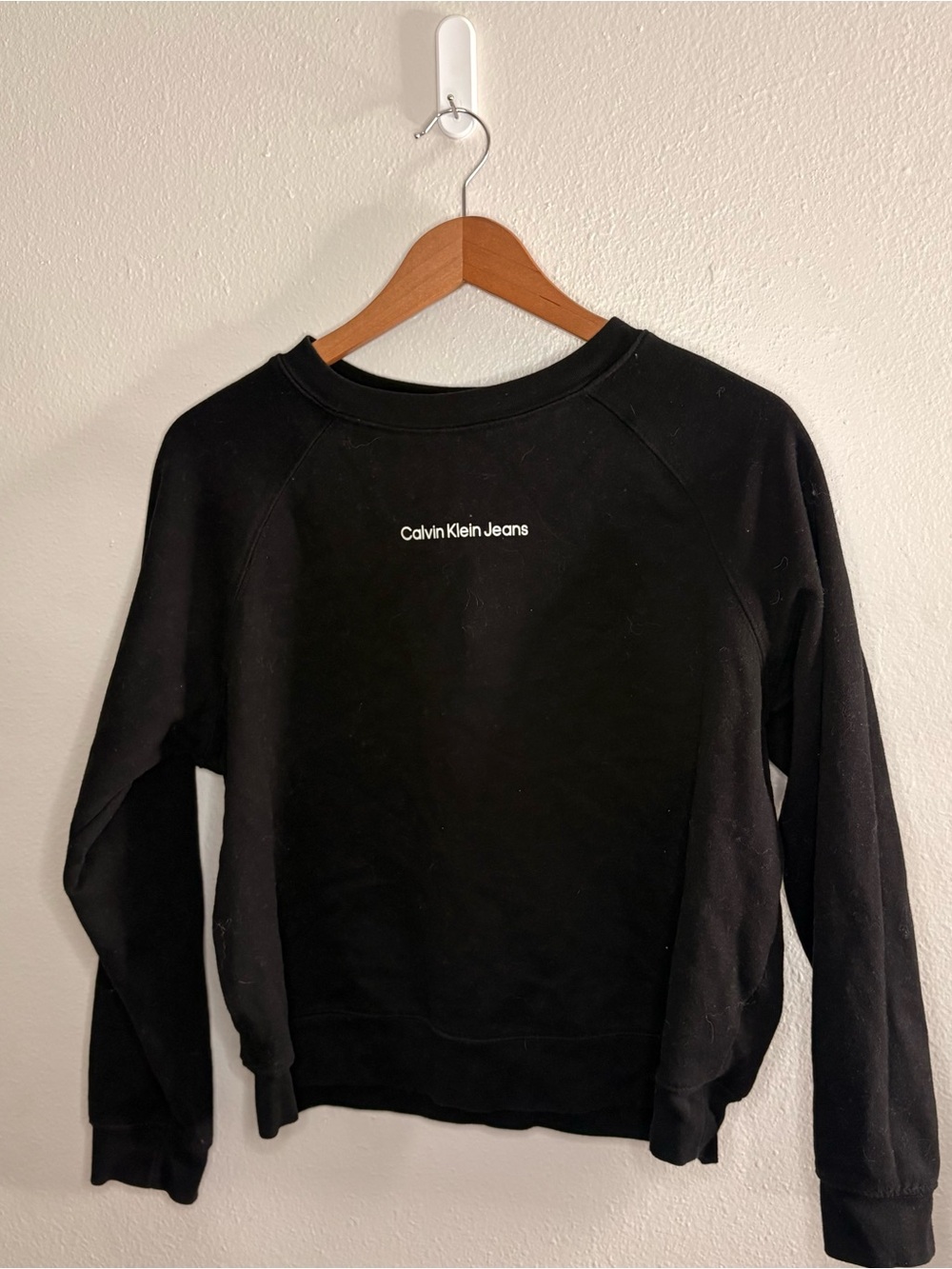 Calvin Klein Jeans Black Pullover with White Logo Tag